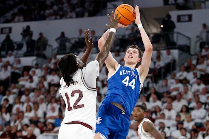 Feb 27, 2024; Starkville, Mississippi, USA; Kentucky Wildcats forward Zvonimir Ivisic (44) shoots as Mississippi State Bulldogs forward KeShawn Murphy (12) defends during the second half at Humphrey Coliseum. Mandatory Credit: Petre Thomas-USA TODAY Sports